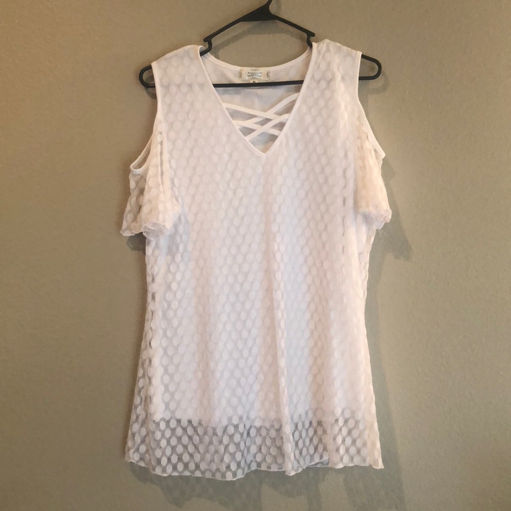 White polka dot shirt